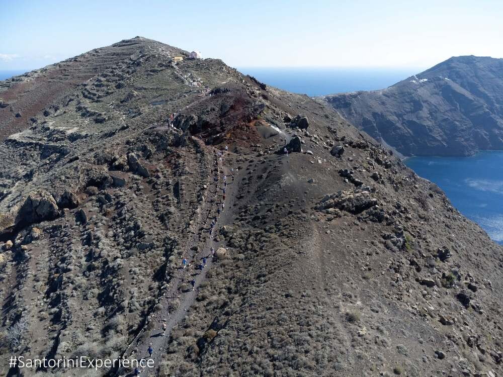 Aestian Hospitality Group as Gold Sponsor: Swimming the Caldera & October Magic at Santorini Experience 2026